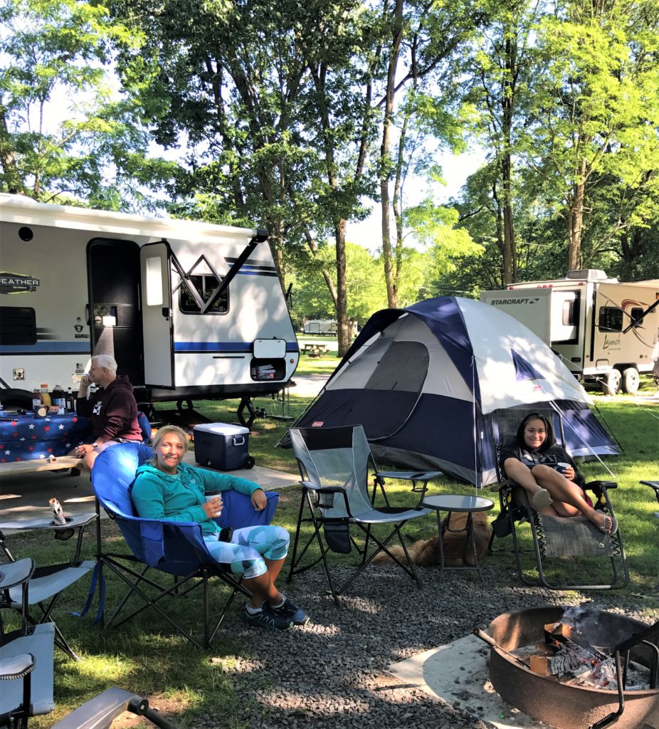 Family RV Camping At A Campground