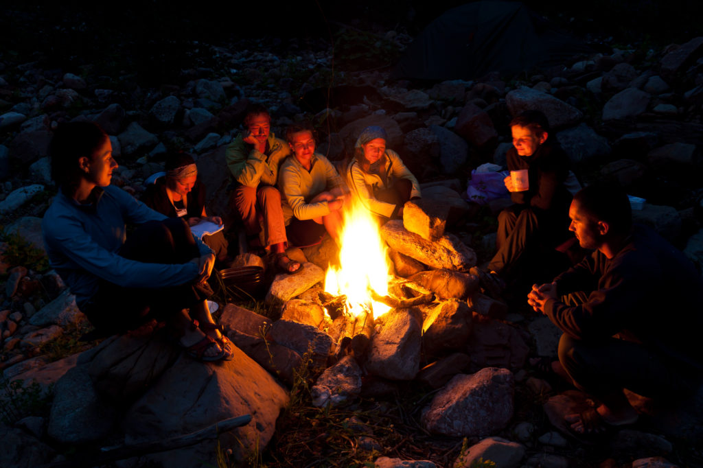 campers around the campfire