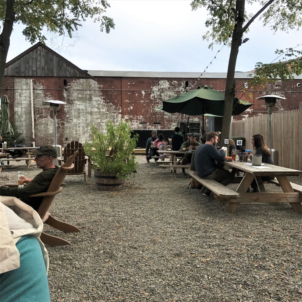 Outdoor seating at Woodstock Brewing