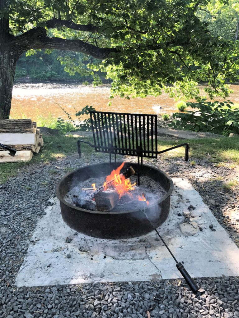 campfire in fire ring at campground