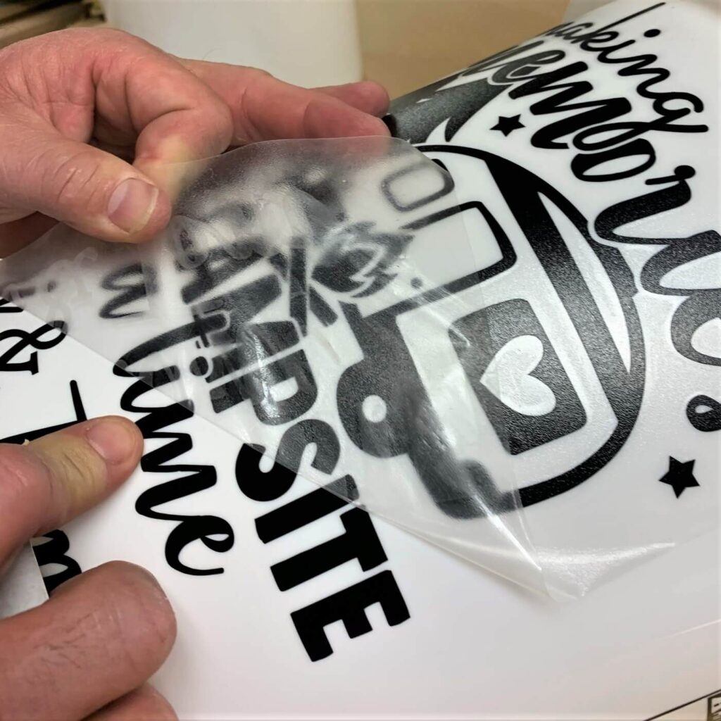 remove transfer tape from vinyl decal